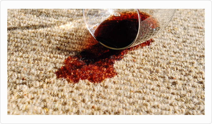 carpet stained with a glass of red wine